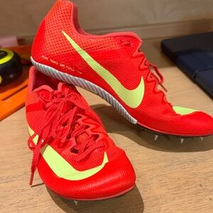 Nike Red and Yellow Running Spikes